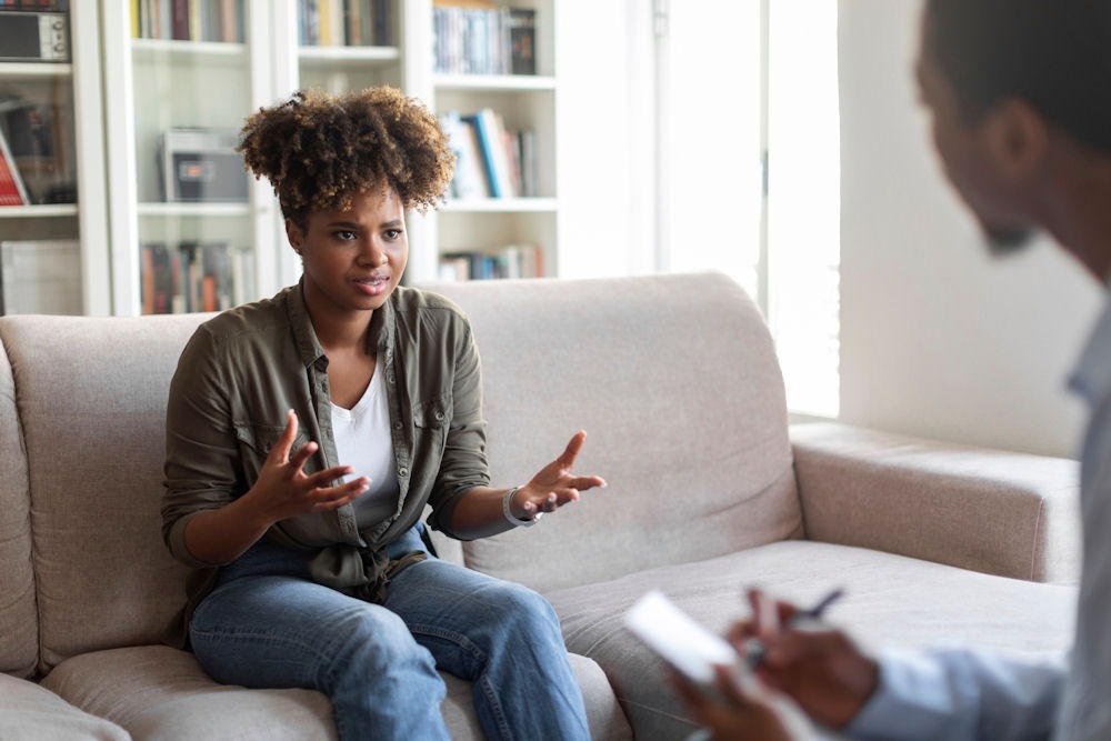 woman talking in therapy